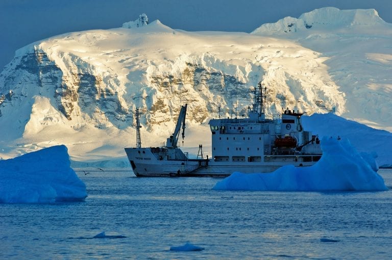 Expeditionvessel Mikheev and icebergs in Antarctica
