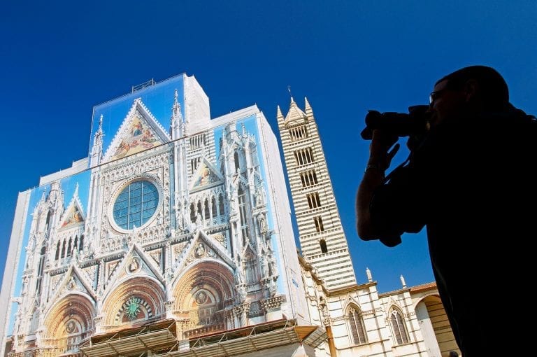The Duomo di Siena - Siena Cathedral - with a tarp on the facade