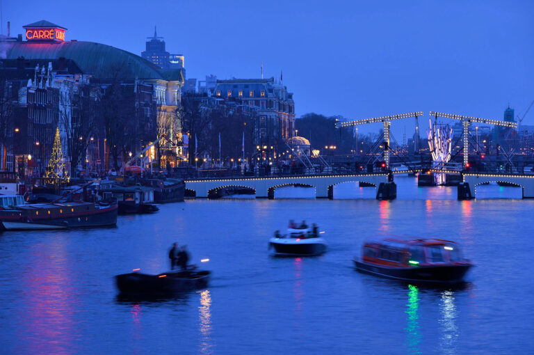 Amsterdam Light Festival and river Amstel with Magere Brug and Carré