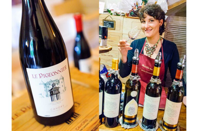 Bottle of wine and young woman in a wine shop.