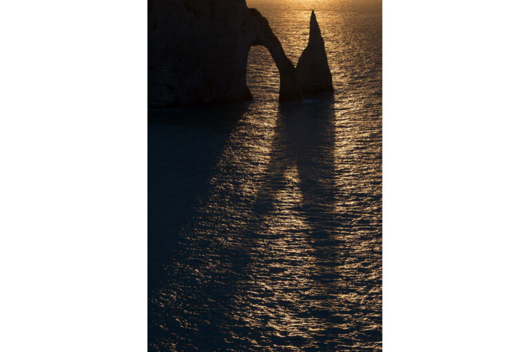 Cliffs Falaise d'Aval and l'Aguille at sunset