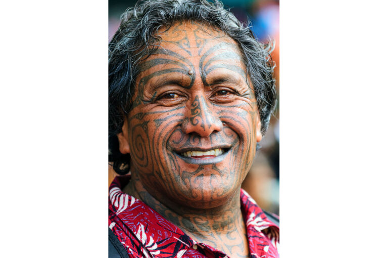 Portrait of a tattooed Maori man