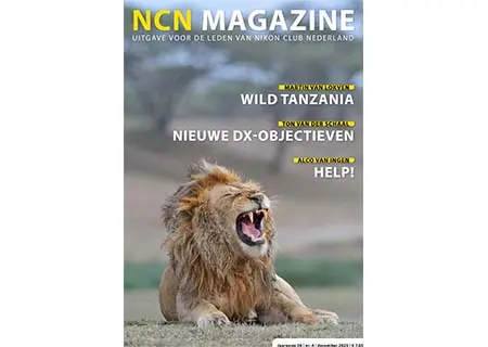 Leeuw op cover Nikon Club Nederland magazine.