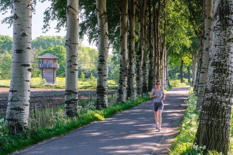 Jogger with replica Roman watchtower.