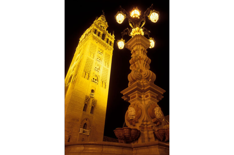 Tower of church or cathedral with lamppost