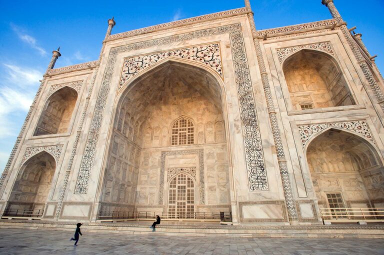 Taj Mahal with visitors, a child is running to its mother.